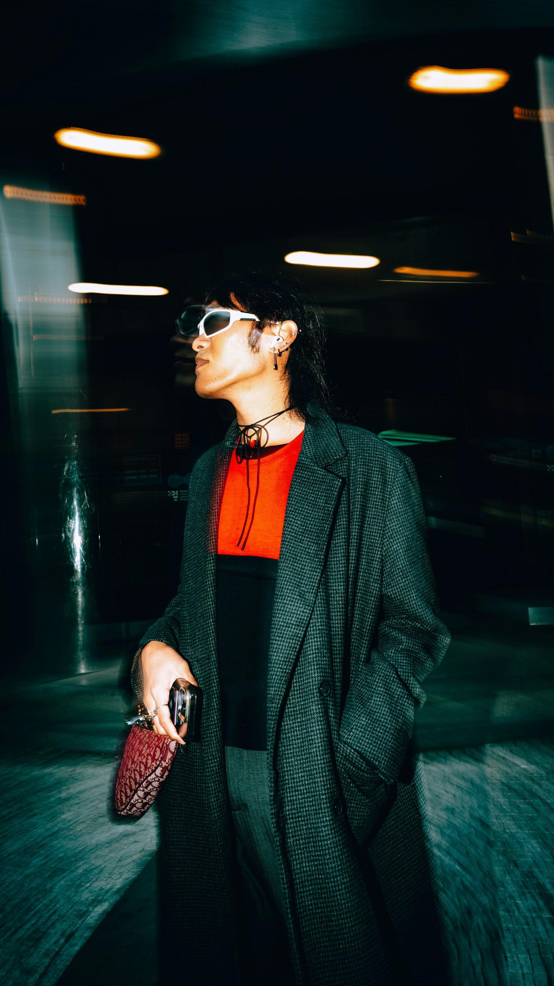 A checked coat at night